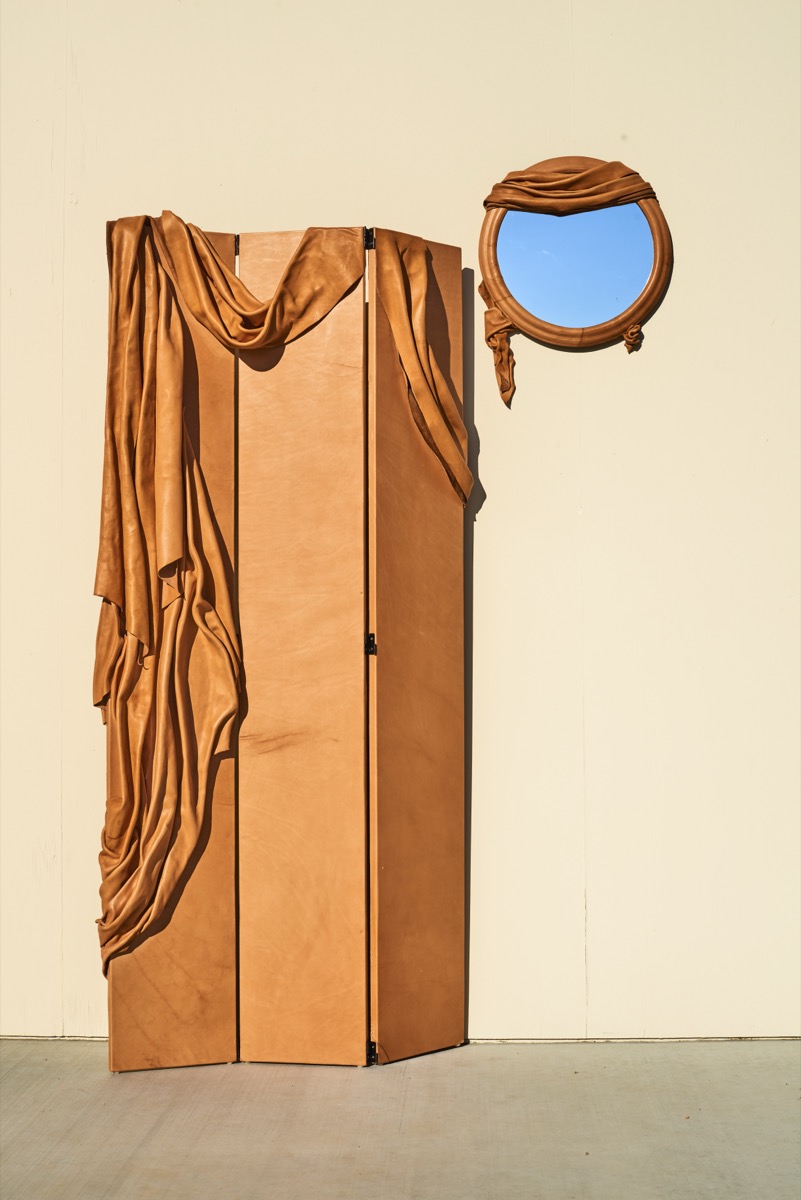 Handcrafted leather mirror using cuir bouilli technique